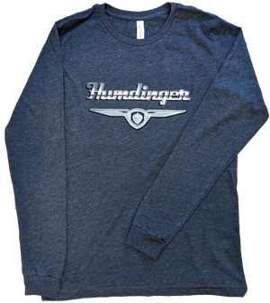 A folded, grey, long sleeve shirt with the Humdinger logo (in a chrome, vintage style) across the front of the shirt. This classic long-sleeve is made with super soft and cozy fabric. It's sure to become a new favourite! Unisex sizing, slim fit.