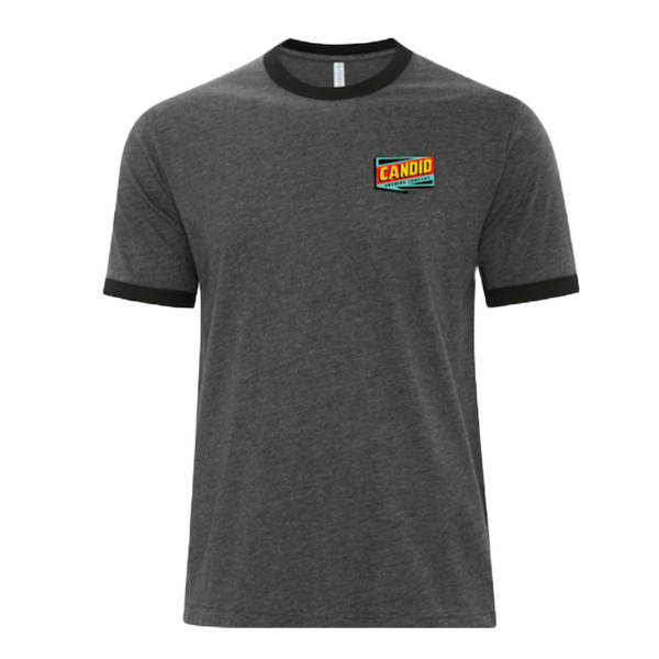 A grey tshirt with the Candid logo over the left breast.