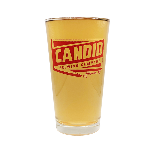 A pint glass of Supersonic beer in a Candid branded pint glass. 
